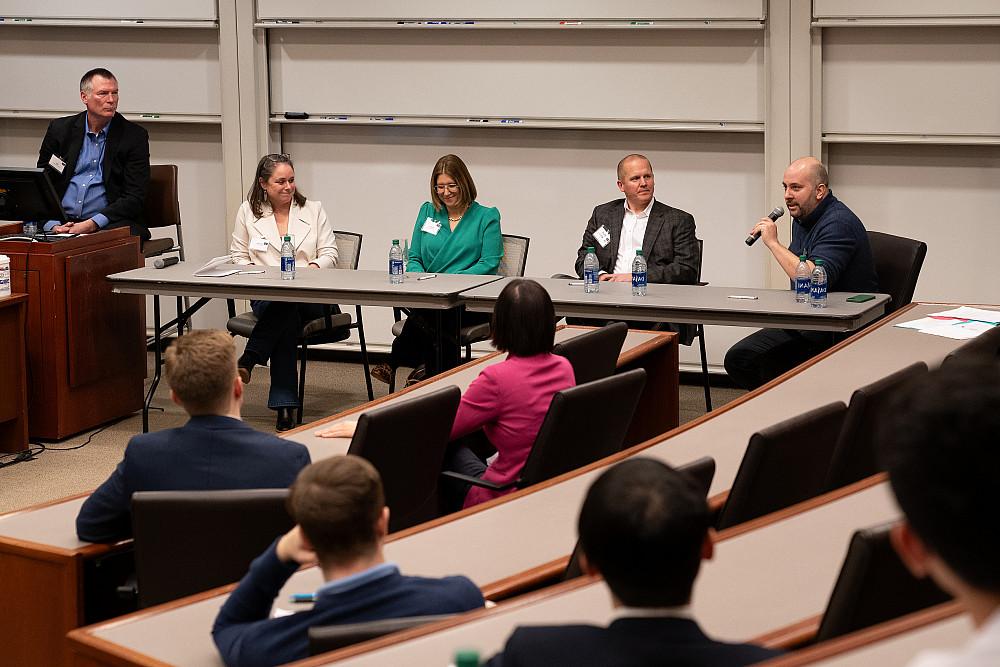 A panel of six accomplished alumni talks to students during the 2024 Business Networking Summit.