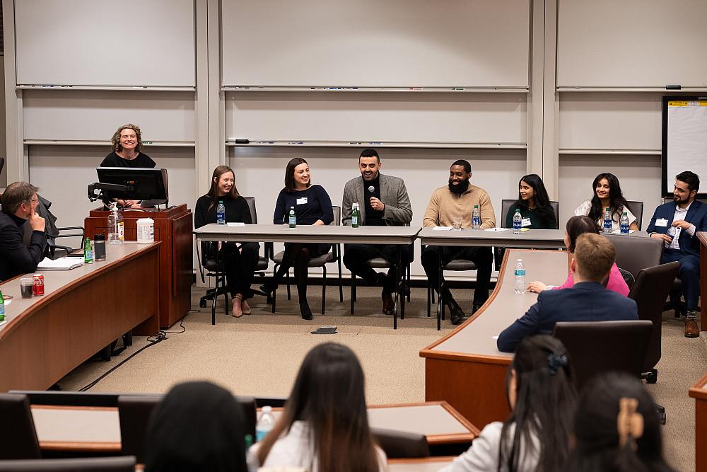 A panel of six recent graduates talks to students during the 2024 Business Networking Summit.